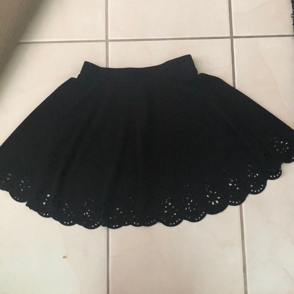 Black mini skirt cutout scallop detail